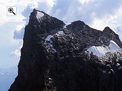 The summit of Store Austanbotntind is threatening and exposed