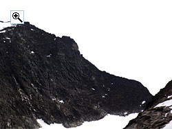 The west ridge of Skarddalseggi rises from the saddle with Skarddalstind