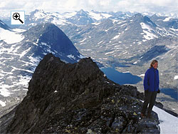 Looking down past Tone Søvdsnes on the north west ridge of Snøholstind. 