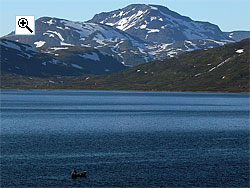 Snholstind looms over Tyin lake