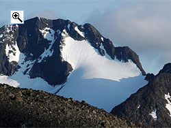 The north face of Semelholstind rises steeply from the glacial corrie