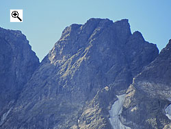 The north face of Midtre Torfinnstind, showing the steep abseil and descent from stre Torfinnstind on the left