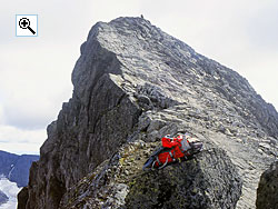 The final 50 metres of slabs up the north ridge are often covered in icy snow during the early summer
