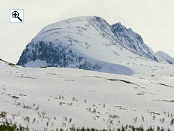 From Sota ster to the north, Tverrdalskyrkja is an imposing mountain