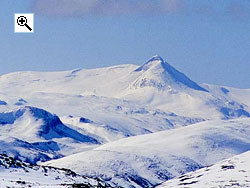 From a distance to the north, Tverrdalskyrkja stands out clearly