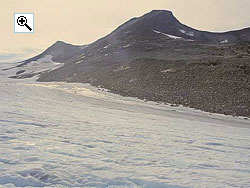 Looking from the Fortundalsbreen glacier up the east ridge to the summit