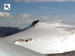 Brenibba is a rounded nunatak which emerges at the northern end of the Jostedalsbreen ice sheet