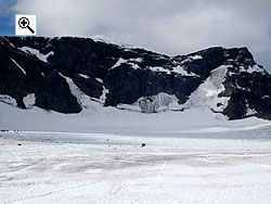 The south top, left, is covered in an ice pyramid while the north top, right, is bare rock